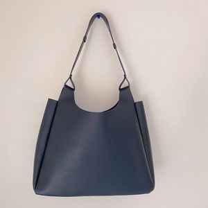 Blue leather shoulder bag, suede lined Neiman Marcus